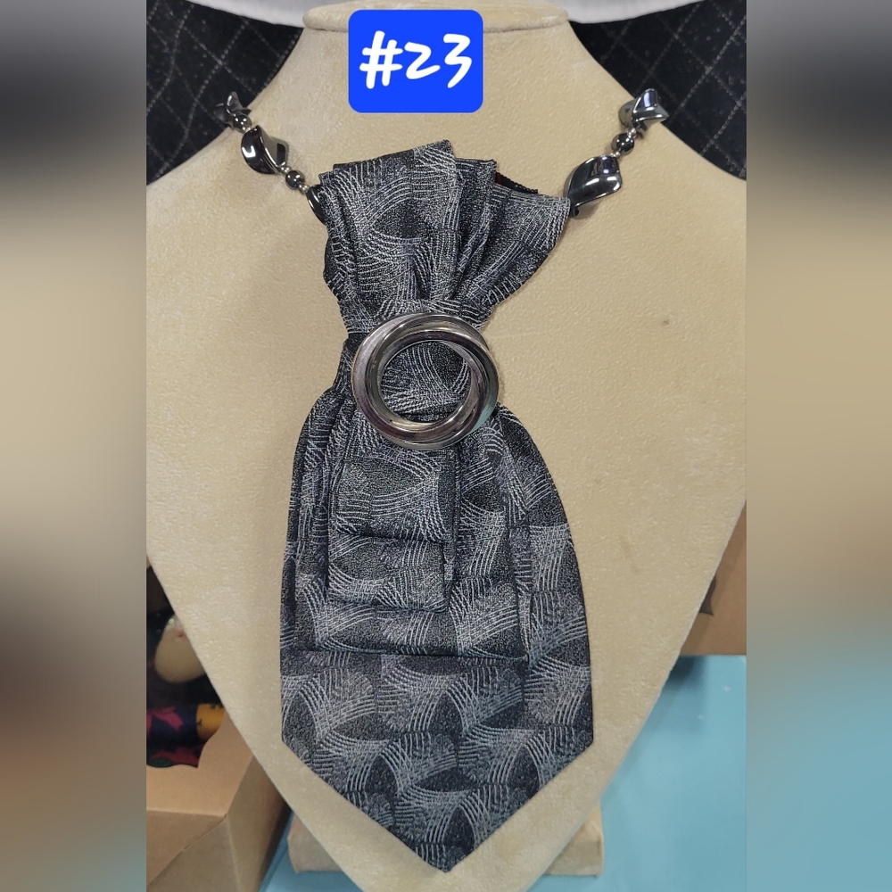 Gray Patterned Silver Twist On A Power Tie Necklace